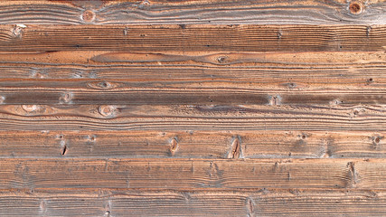Naklejka premium Rough brown wood plank. Wooden texture background.