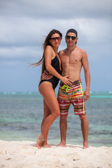 Fototapeta premium Beach couple walking on romantic travel.
