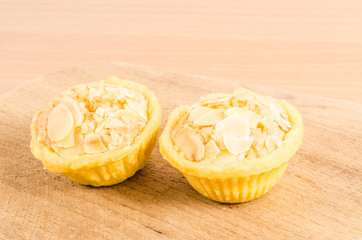 Almonds tart on wooden board