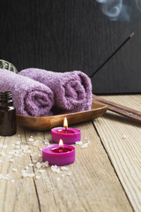 Obraz na płótnie Canvas Spa.Scented Candles, Essential Oil and Towels