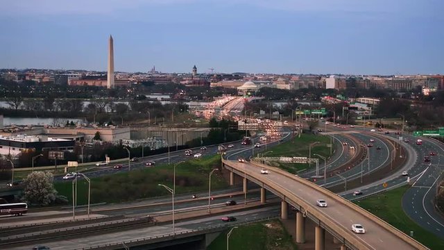 Washington, DC, USA skyline with monument and highways.