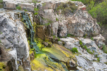A small waterfall with droplets