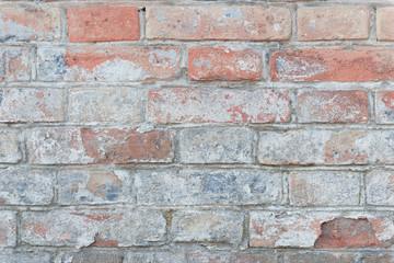 Texture. Brick. Wall. A background with attritions and cracks
