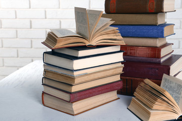 Heap of old books on table close up