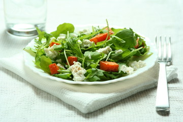 Ruccola salad with baked pumkin and goat cheese