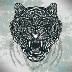 Figure vector wild animal tiger with a grin of decorative pattern of lines and dots on the shabby background. Can be used for printing, tattoos and jewelry for you. work of the author.