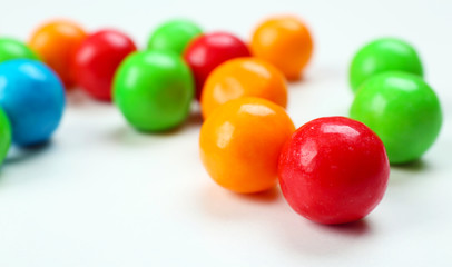 Closeup colorful candies on white background