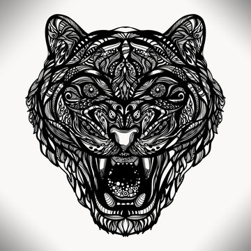 Figure vector wild animal tiger with a grin of decorative pattern of lines and dots. Can be used for printing, tattoos and jewelry for you. work of the author.