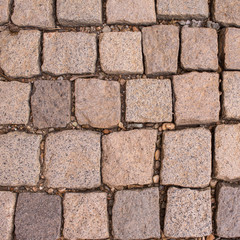 Granite cobblestoned pavement background