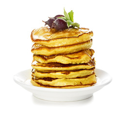 Pancakes with maple syrup isolated