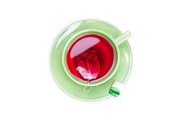 Cup with teabag on white background