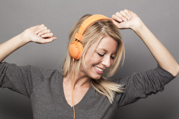 pretty young woman enjoying good vibes on headphones
