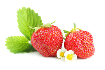 Strawberries berries with leaves isolated on white