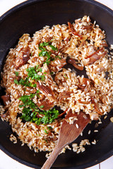 risotto with mushrooms in pan
