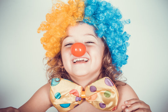 beautiful  girl smiling with clown wig