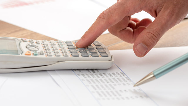 Closeup of accountant doing a calculation