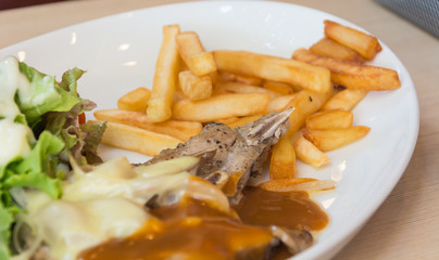 pork chop steak with cheese and black pepper mushroom gravy