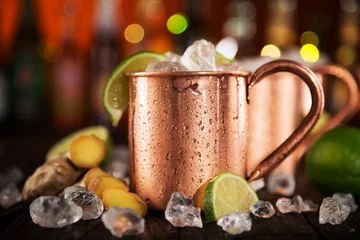 Foto auf Leinwand Cold Moscow Mules - Ginger Beer, lime and Vodka © Lukas Gojda