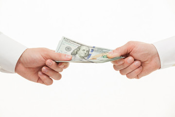 Businesspeople's hands holding dollars