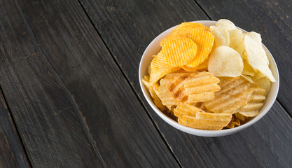 potato chips on wood background