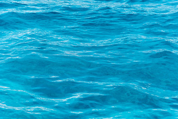 Blue ripple water wave in sea ocean.