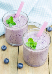 Fresh smoothie with blueberry, banana and yogurt