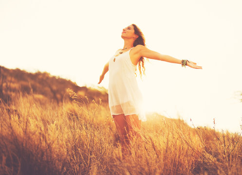 Happy Young Woman Outdoors at Susnet. Fashion Lifestyle.