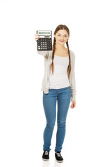 Young woman hold digital calculator. 