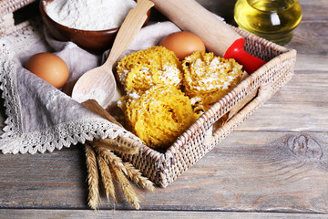 Still life of preparing pasta on rustic wooden background