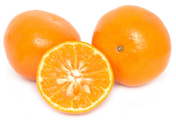 Ripe tangerines on a white background