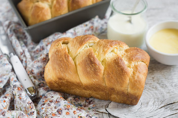 brioche on a light wooden background