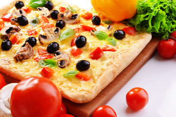 Delicious homemade pizza on white background