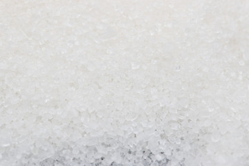 white sugar on a black background