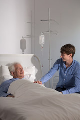 Obraz premium Grandfather under drip