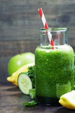 Fresh organic green smoothie - detox, diet and healthy food conc