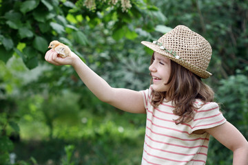 beautiful little girl holding cute yellow chicken