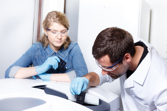 Scientists research in a lab environment