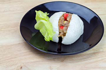 Chinese steamed bun with crab stick, quail egg and pork stuff