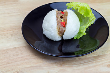 Chinese steamed bun with crab stick, quail egg and pork stuff