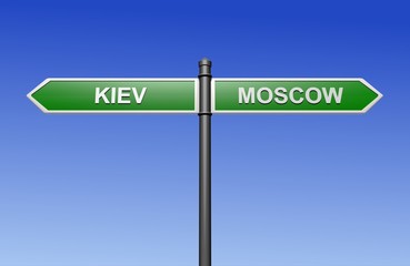 Signpost with arrows pointing two directions - towards Kiev and Moscow.