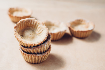 Little homemade oat tarts with whipped cream
