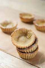 Little homemade oat tarts with whipped cream