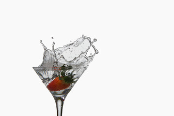 strawberry cocktail drink with splash on white background