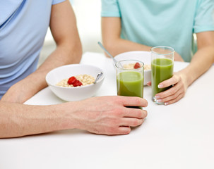 close up of couple having breakfast at home