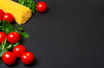 Raw pasta with tomatoes and parsley