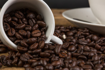 Coffee bean on grunge wooden background