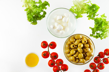 different types of olives and mozzarella with cherry tomatoes an