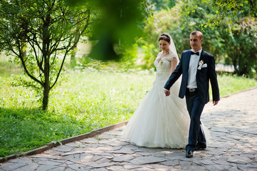 just married in love walking at the park