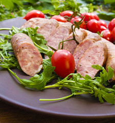 Smoked sausages with greens, cherry tomatoes 