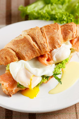 Poached egg with red fish